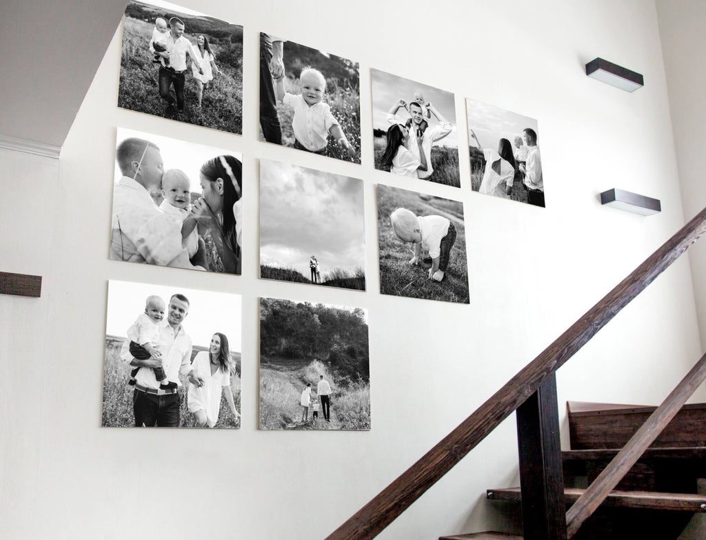 Family wall gallery of metal photo prints.